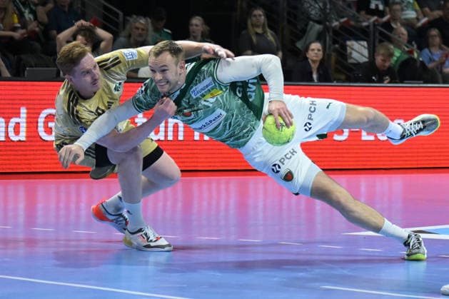 21 05 2026, xlakx, Handball Daikin HBL, Fuechse Berlin TSV Hannover Burgdorf v l Lukas Stutzke TSV Hannover Burgdorf , Mathias Gidsel Fuechse Berlin duel, duel, fight, tackle Berlin Daniel Lakomski