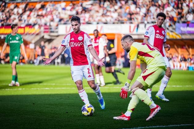 VOLENDAM , 21-05-2026 , Kras Stadium, season 2025 2026 , Play-offs for European football , Dutch Eredivisie Football . Match between Ajax and FC Groningen , picture shows Ajax player Lucas Rosa and Ajax goalkeeper Maarten Paes Ajax - Groningen (play off)  x203865537x Copyright: