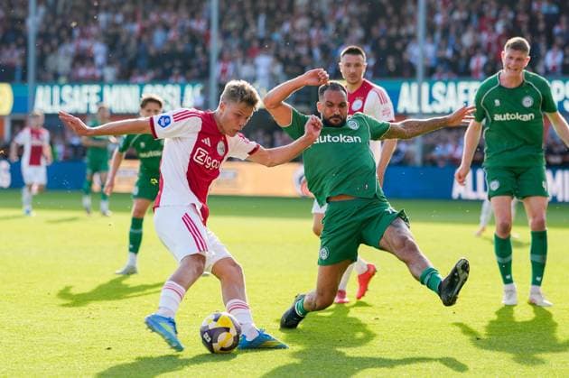 VOLENDAM , 21-05-2026 , Kras Stadium, season 2025 2026 , Play-offs for European football , Dutch Eredivisie Football . Match between Ajax and FC Groningen , picture shows Ajax player Sean Steur and FC Groningen player Marvin Peersman Ajax - Groningen (play off)  x203865762x Copyright: