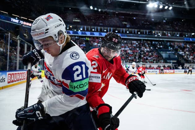 260521 Mikkel Eriksen of Norway and Evan Bouchard of Canada during the 2026 IIHF Ice Hockey World Championship between Canada and Norway on May 21, 2026 in Fribourg Photo Jesper Zerman BILDBYRAN kod JZ JZ0724 ishockey ice hockey ishockey vm 2026 vm 2026 iihf world championship kanada canada norge norway bbeng  Copyright: JESPERxZERMAN BB260521JZ127