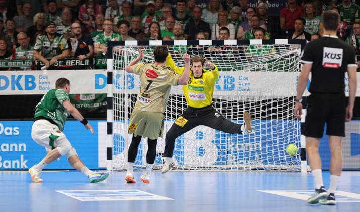 Mijajlo Marsenic scores a goal against goalkeeper Joel Birlehm duel Game scene Action Sport Handball HBL Bundesliga Men 32 Matchday Season 2025 2026 21 05 2026 Füchse Berlin vs TSV Hannover Burgdorf