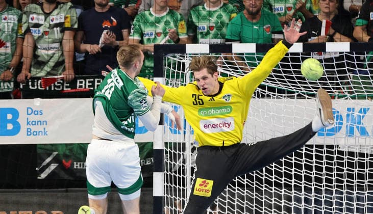 Mathias Gidsel scores a goal against goalkeeper Joel Birlehm duel Game scene Action Sport Handball HBL Bundesliga Men 32 Matchday Season 2025 2026 21 05 2026 Füchse Berlin vs TSV Hannover Burgdorf