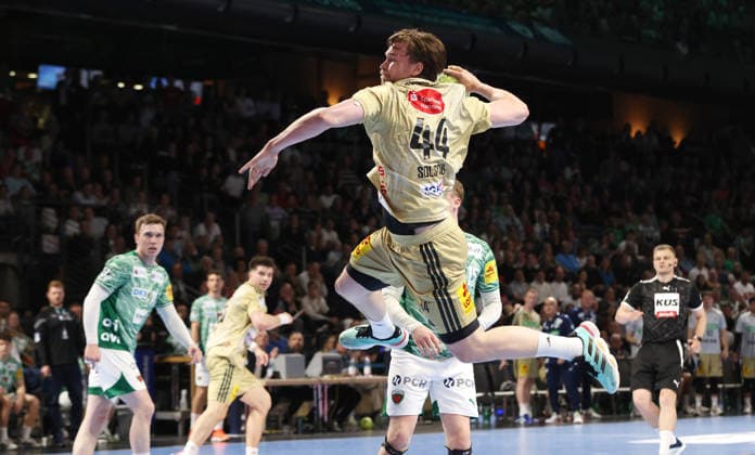Thomas Alfred Solstad scores a goal against goalkeeper Lasse Ludwig duel Game scene Action Sport Handball HBL Bundesliga Men 32 Matchday Season 2025 2026 21 05 2026 Füchse Berlin vs TSV Hannover Burgdorf