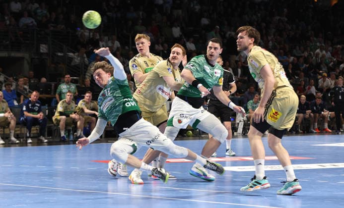Nils Lichtlein scores a goal, August Pedersen, Mijajlo Marsenic, Thomas Alfred Solstad duel Match scene Action Sport Handball HBL Bundesliga Men 32 Matchday Season 2025 2026 21 05 2026 Füchse Berlin vs TSV Hannover Burgdorf