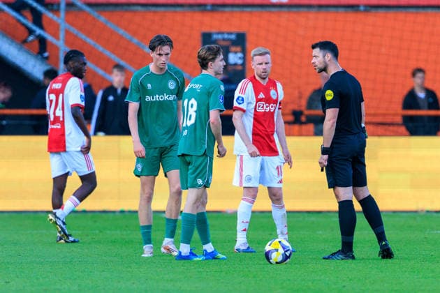 2026-05-21 AFC Ajax v FC Groningen - Dutch Eredivisie Play-Offs VOLENDAM, NETHERLANDS - MAY 21: Tygo Land of FC Groningen, Referee Marc Nagtegaal, Davey Klaassen of Ajax during the Dutch Eredivisie Play-Offs match between AFC Ajax and FC Groningen at Kras Stadion on May 21, 2026 in Volendam, Netherlands. Volendam Kras Stadion Netherlands Content not available for redistribution in The Netherlands directly or indirectly through any third parties. Copyright: xMarcelxvanxPlateringenx