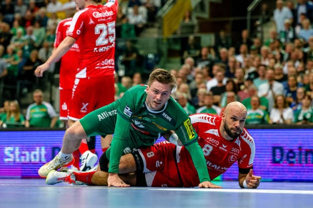 Franz Semper SC DHfK Leipzig, 32 and Adrian Sipos MT Melsungen, 08 on the floor, SC DHfK Leipzig vs MT Melsungen, Handball, 1 Bundesliga, Matchday 32, Season 2025 2026, 21 05 2026, SC DHfK Leipzig vs MT Meslungen, Handball, 1 Bundesliga, Matchday 32, Season 2025 2026, 21 05 2026 Leipzig Copyright: xEibner-Pressefoto LauraxRoemerx EP_LRR