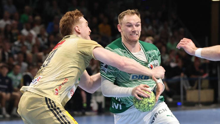 Lukas Stutzke, Mathias Gidsel on the ball duel Match scene Action Sport Handball HBL Bundesliga Men 32 Matchday Season 2025 2026 21 05 2026 Füchse Berlin vs TSV Hannover Burgdorf
