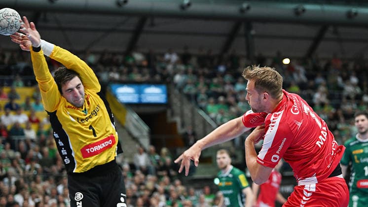 Handball Bundesliga, Season 2025 2026, Matchday 32, SC DHfK Leipzig vs MT Melsungen 21 05 2026 Goalkeeper David Mandic Outfielder Melsungen, back number 7 vs Domenico Ebner Goalkeeper Goalkeeper DHfK Leipzig, back number 1 at Handball Bundesliga match DHfK Leipzig vs MT Melsungen 21 05 2026 Leipzig Saxony Germany QUARTERBACK Real Estate Arena Am Sportforum 2