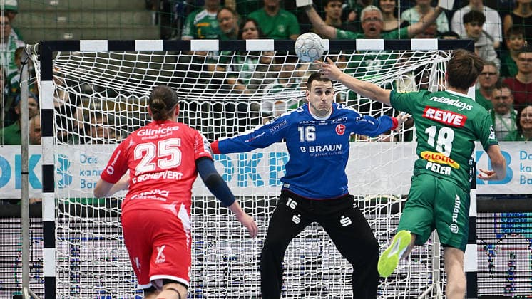 Handball Bundesliga, Season 2025 2026, Matchday 32, SC DHfK Leipzig vs MT Melsungen 21 05 2026 Goalkeeper Staffan Peter Outfield player DHfK Leipzig, back number 18 vs Nebojsa Simic Goalkeeper Melsungen, back number 16 at Handball Bundesliga match DHfK Leipzig vs MT Melsungen 21 05 2026 Leipzig Saxony Germany QUARTERBACK Real Estate Arena Am Sportforum 2