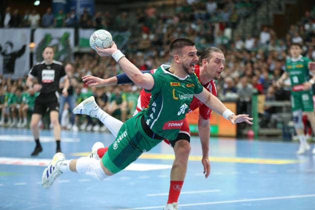 Handball DAIKIN HBL, SC DHfK Leipzig MT Melsungen 21 05 2026 Luka Rogan 33, SC DHfK Leipzig throws in the fall Handball, DAIKIN HBL, 1 Bundesliga, Season 2025 2026, 32 Matchday SC DHfK Leipzig vs MT Melsungen on 21 05 2026 at the Quarterback Immobilien Arena Leipzig Copyright: xBEAUTIFULxSPORTS JanxKaeferx