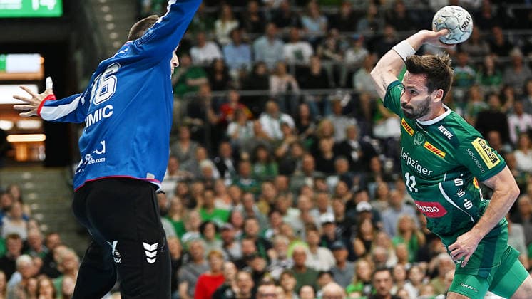 Handball Bundesliga, Season 2025 2026, Matchday 32, SC DHfK Leipzig vs MT Melsungen 21 05 2026 Goalkeeper Lukas Binder Wing player DHfK Leipzig, back number 11 right against Nebojsa Simic Goalkeeper Melsungen, back number 16 left at Handball Bundesliga match DHfK Leipzig vs MT Melsungen 21 05 2026 Leipzig Saxony Germany QUARTERBACK Immobilien Arena Am Sportforum 2