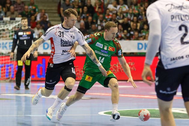 21 05 2026, xgox, Handball Daikin HBL SC Magdeburg SG Flensburg Handewitt emspor, v l Emil Jakobsen Flensburg, 31 , Omar Ingi Magnusson Magdeburg, 14 duel, duel, fight, tackle Magdeburg