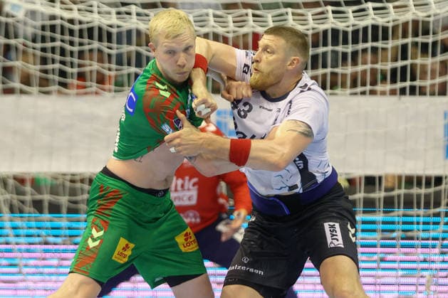 21 05 2026, xtgx, Handball, Daikin HBL, SC Magdeburg SG Flensburg Handewitt v l Magnus Saugstrup Magdeburg, 23 Blaz Blagotsinek Flensburg, 43 duel, duel, fight, tackle Magdeburg