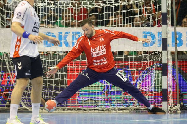 21 05 2026, xtgx, Handball, Daikin HBL, SC Magdeburg SG Flensburg Handewitt v l Benjamin Buric Flensburg, 1 parade, holds the ball, catches the ball, parries Magdeburg