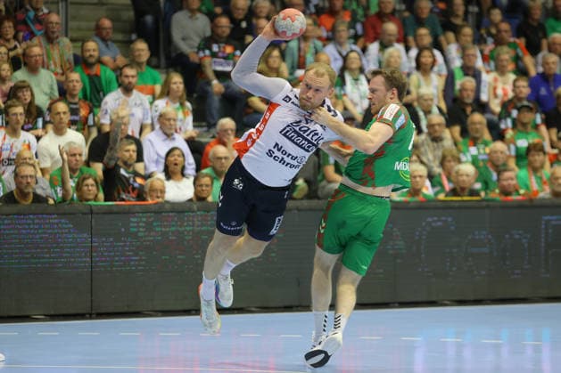 21 05 2026, xtgx, Handball, Daikin HBL, SC Magdeburg SG Flensburg Handewitt v l Simon Pytlick Flensburg, 2 , Felix Claar Magdeburg, 7 duel, duel, fight, tackle throws goal, goal scorer, scores goal, scores the goal Magdeburg