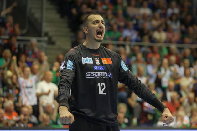 21 05 2026, xtgx, Handball, Daikin HBL, SC Magdeburg SG Flensburg Handewitt v l Matej Mandic Magdeburg, 12 cheers over held ball, defended, held, Torhueter Magdeburg