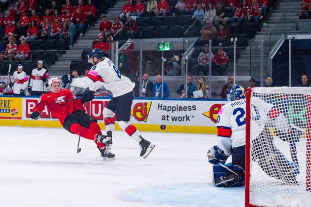 ZURICH, SWITZERLAND - MAY 21: Bradley Jenion (Great Britain, 8) against Christian Marti (Switzerland, 54) in front of the goal from Mat Robson (Great Britain, 20) during the Preliminary Round - Group A Match 31 between Switzerland and Great Britain at the IIHF Ice hockey, Eishockey World Championship, WM, Weltmeisterschaft 2026, Swiss Life Arena on May 21, 2026 in Zurich, Switzerland. Zurich Switzerland Copyright: xTimoxSteinx