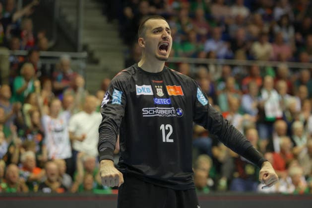 21 05 2026, xtgx, Handball, Daikin HBL, SC Magdeburg SG Flensburg Handewitt v l Matej Mandic Magdeburg, 12 cheers over held ball, defended, held, Torhueter Magdeburg
