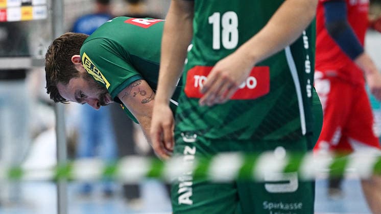 Handball Bundesliga, Season 2025 2026, Matchday 32, SC DHfK Leipzig vs MT Melsungen 21 05 2026 Disappointment among players from Leipzig after the defeat in the Handball Bundesliga match DHfK Leipzig vs MT Melsungen 21 05 2026 On display Lukas Binder Outfield player DHfK Leipzig, shirt number 11 Leipzig Saxony Germany QUARTERBACK Immobilien Arena Am Sportforum 2