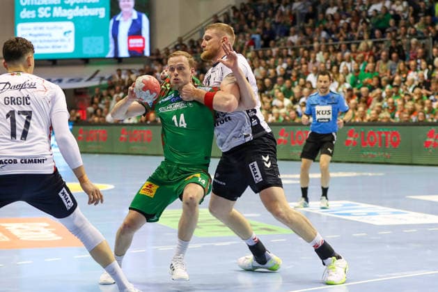 21 05 2026, xgox, Handball Daikin HBL SC Magdeburg SG Flensburg Handewitt emspor, v l Omar Ingi Magnusson Magdeburg, 14 , Blaz Blagotsinek Flensburg, 43 duel, duel, fight, tackle Magdeburg