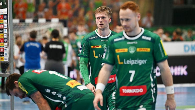 Handball Bundesliga, Season 2025 2026, Matchday 32, SC DHfK Leipzig vs MT Melsungen 21 05 2026 Disappointment among players from Leipzig after the defeat in the Handball Bundesliga match DHfK Leipzig vs MT Melsungen 21 05 2026 Lukas Binder outside center DHfK Leipzig, shirt number 11 , Franz Semper backcourt player DHfK Leipzig, shirt number 32 , Tomas Piroch backcourt player DHfK Leipzig, shirt number 7 Leipzig Saxony Germany QUARTERBACK Immobilien Arena Am Sportforum 2