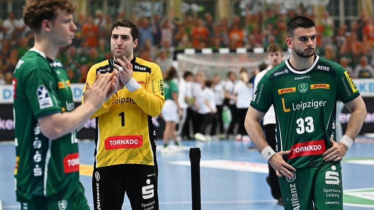 Handball Bundesliga, Season 2025 2026, Matchday 32, SC DHfK Leipzig vs MT Melsungen 21 05 2026 Disappointment among players from Leipzig after the defeat in the Handball Bundesliga match DHfK Leipzig vs MT Melsungen 21 05 2026 On display Domenico Ebner Goalkeeper Goalkeeper DHfK Leipzig, back number 1 , Luka Rogan Circle Circle runner DHfK Leipzig, back number 33 Leipzig Saxony Germany QUARTERBACK Real Estate Arena Am Sportforum 2