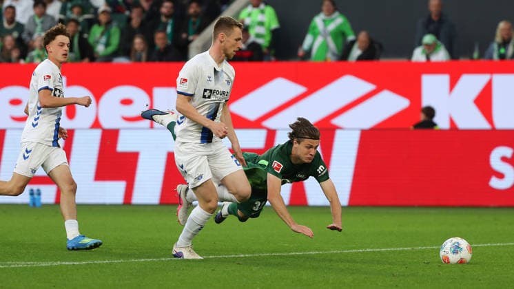 VfL vs Paderborn, Relegation Wolfsburg, 21 05 2026, Football, Men, Relegation, Season 2025 2026, VfL Wolfsburg vs SC Paderborn 07 Tjark Scheller SC Paderborn , Mattias Svanberg VfL Wolfsburg DFL DFB REGULATIONS PROHIBIT ANY USE OF PHOTOGRAPHS as IMAGE SEQUENCES and or QUASI VIDEO Volkswagen Arena Niedersachsen Germany