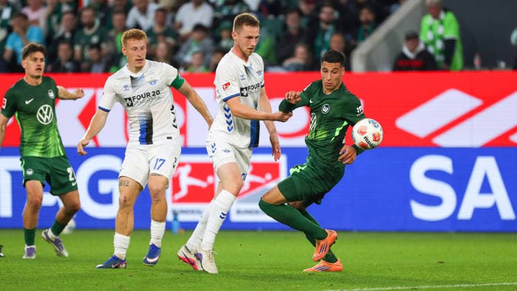 VfL vs Paderborn, Relegation Wolfsburg, 21 05 2026, Football, Men, Relegation, Season 2025 2026, VfL Wolfsburg vs SC Paderborn 07 Tjark Scheller SC Paderborn , Adam Daghim VfL Wolfsburg DFL DFB REGULATIONS PROHIBIT ANY USE OF PHOTOGRAPHS as IMAGE SEQUENCES and or QUASI VIDEO Volkswagen Arena Niedersachsen Germany