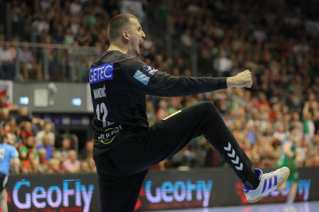 21 05 2026, xtgx, Handball, Daikin HBL, SC Magdeburg SG Flensburg Handewitt v l Matej Mandic Magdeburg, 12 cheers over held ball, defended, held, Torhueter Magdeburg