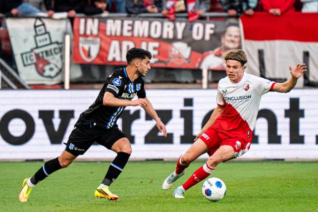 2026-05-21 FC Utrecht v SC Heerenveen - Dutch Eredivisie Conference League Play Offs Semi-Final UTRECHT, NETHERLANDS - MAY 21: Luca Oyen of SC Heerenveen, Niklas Vesterlund of FC Utrecht battle for the ball during the Dutch Eredivisie Conference League Play Offs Semi-Final match between FC Utrecht and SC Heerenveen at Stadion Galgenwaard on May 21, 2026 in Utrecht, Netherlands. Utrecht Stadion Galgenwaard Netherlands Content not available for redistribution in The Netherlands directly or indirectly through any third parties. Copyright: xGabrielxCalvinoxAlonsox