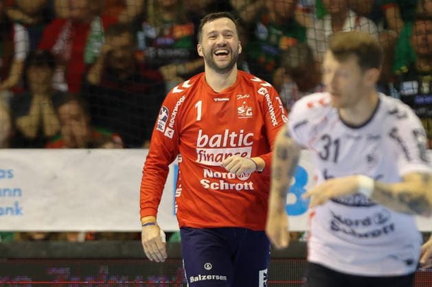 21 05 2026, xtgx, Handball, Daikin HBL, SC Magdeburg SG Flensburg Handewitt v l Benjamin Buric Flensburg, 1 cheers over held ball, defended, held, Torhueter Magdeburg