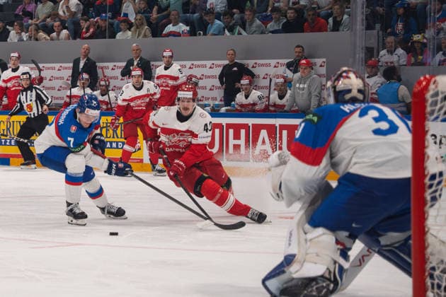 FRIBOURG, FRIBOURG - MAY 21: Maxim Strbak of Slovakia battles with Anders Koch of Denmark during the 2026 IIHF World Championship, WM, Weltmeisterschaft Preliminary Round Group B match between Denmark and Slovakia at BCF Arena on May 21, 2026 in Fribourg, Fribourg, Switzerland. Copyright: xLivioxBaeriswylx xSPPx Sportspressphoto_SPR151264