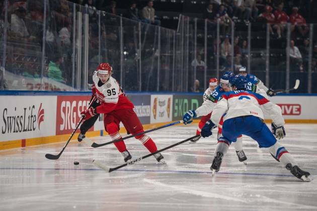 FRIBOURG, FRIBOURG - MAY 21: Nick Olesen of Denmark battles with Kristian Pospisil of Slovakia during the 2026 IIHF World Championship, WM, Weltmeisterschaft Preliminary Round Group B match between Denmark and Slovakia at BCF Arena on May 21, 2026 in Fribourg, Fribourg, Switzerland. Copyright: xLivioxBaeriswylx xSPPx Sportspressphoto_SPR151268
