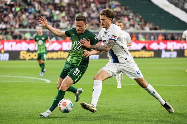 Yannick Gerhardt VfL Wolfsburg,31 vs Calvin Brackelmann SC Paderborn,4 First leg relegation 2026, 1 Soccer Bundesliga season 2025 2026 VfL Wolfsburg vs SC Paderborn at the Volkswagen Arena in Wolfsburg Action,Soccer,Germany,Man,Men,21 05 2026