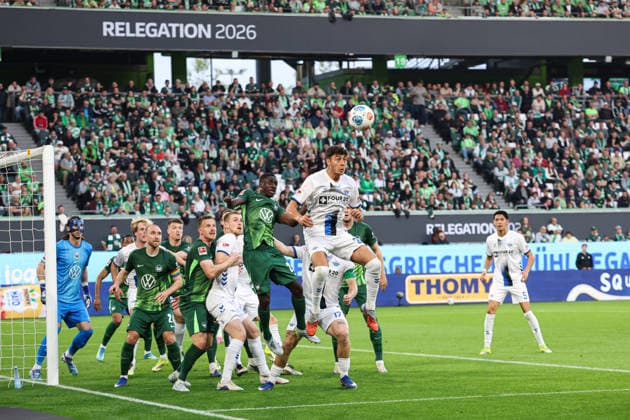 Stefano Marino SC Paderborn,30 vs Sael Kumbedi VfL Wolfsburg,26 First leg relegation 2026, 1 Football Bundesliga Season 2025 2026 VfL Wolfsburg vs SC Paderborn at the Volkswagen Arena in Wolfsburg Action,Football,Germany,Man,Men,21 05 2026