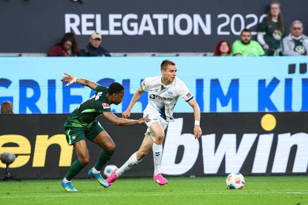 Filip Bilbija SC Paderborn,7 vs Jeanuel Belocian VfL Wolfsburg,6 First leg relegation 2026, 1 Football Bundesliga Season 2025 2026 VfL Wolfsburg vs SC Paderborn at the Volkswagen Arena in Wolfsburg Action,Football,Germany,Man,Men,21 05 2026