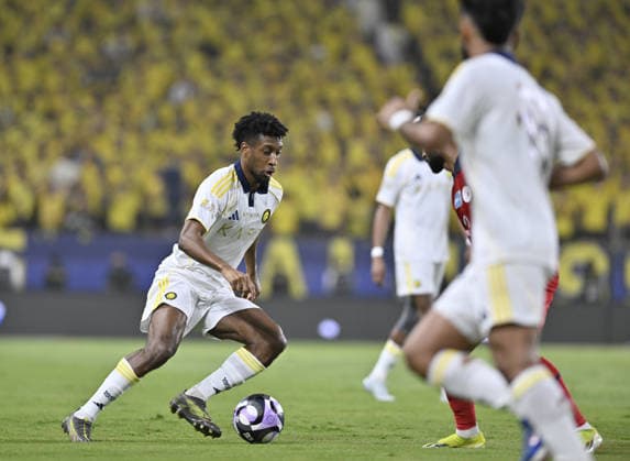Al-Nassr v Damac - Saudi Pro League RIYADH, SAUDI ARABIA - MAY 21: Kingsley Coman (L) of Al Nassr in action during the Saudi Pro League football match between Al Nassr and Damac FC at Alawwal Park (King Saud University Stadium) in Riyadh, Saudi Arabia, on May 21, 2026. Mohammed Saad Anadolu Riyadh Saudi Arabia. Editorial use only. Please get in touch for any other usage.  Copyright: x2026xAnadoluxMohammedxSaadx