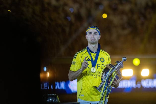 Al-Nassr wins Saudi Arabian title RIYADH, SAUDI ARABIA - MAY 21: Ronaldo of Al-Nassr is presented the championship trophy after defeating Damac 4-1 in the Saudi Pro League at King Saud University Stadium in Riyadh, Saudi Arabia, on May 21, 2026. Mohammed Saad Anadolu Riyadh Saudi Arabia. Editorial use only. Please get in touch for any other usage.  Copyright: x2026xAnadoluxMohammedxSaadx