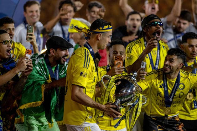 Al-Nassr wins Saudi Arabian title RIYADH, SAUDI ARABIA - MAY 21: Ronaldo of Al-Nassr is presented the championship trophy after defeating Damac 4-1 in the Saudi Pro League at King Saud University Stadium in Riyadh, Saudi Arabia, on May 21, 2026. Mohammed Saad Anadolu Riyadh Saudi Arabia. Editorial use only. Please get in touch for any other usage.  Copyright: x2026xAnadoluxMohammedxSaadx