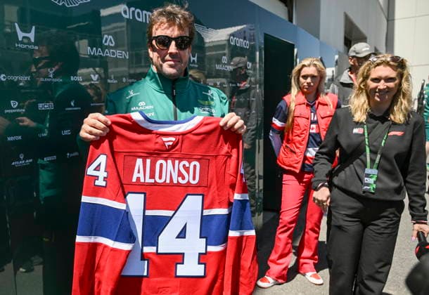 May 21, 2026, Montreal, Qc, CANADA: Aston Martin Racing driver Fernando Alonso of Spain shows off a Montreal Canadiens hockey jersey as he speaks in the paddocks ahead of Formula One auto racing Canadian Grand Prix in Montreal on Thursday, May 21, 2026. Canada News - May 21, 2026  - ZUMAc35_ 20260521_zaf_c35_103 Copyright: xGrahamxHughesx
