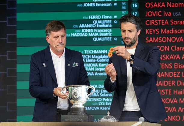 (260522) -- PARIS, May 22, 2026 -- IOC member Tony Estanguet (R) reacts during the draw for the French Open tennis tournament, at Roland Garros Stadium in Paris, France, on May 21, 2026. ) (SP)FRANCE-PARIS-TENNIS-FRENCH OPEN-DRAW WuxHuiwo 