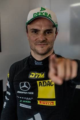 Lucas Auer wears the team kit of Mercedes AMG Team Landgraf with the sponsors DEKRA, DTM, ADAC and Pirelli The driver is positioned in the paddock or paddock area Lucas Auer of Mercedes AMG Team Landgraf in the paddock Copyright: xMichaelxSchäferx