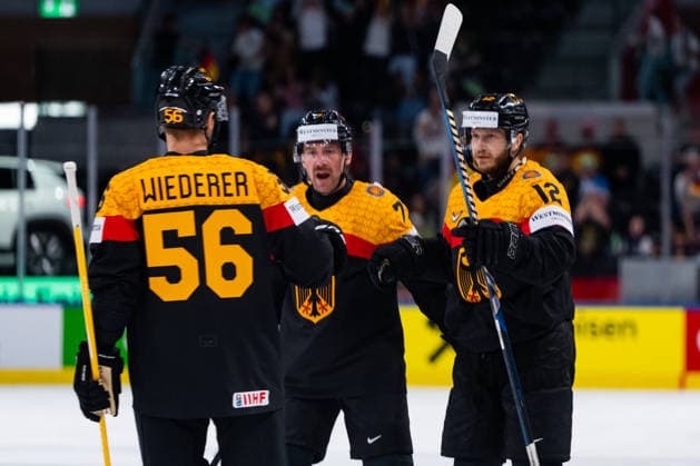 ZURICH, SWITZERLAND - MAY 22: Eric Mik (Germany, 12) Dominik Kahun (Germany, 72)Manuel Wiederer (Germany, 56) during their goal celebration during the Preliminary Round - Group A Match 33 between Germany and Hungary at the IIHF Ice hockey, Eishockey World Championship, WM, Weltmeisterschaft 2026, Swiss Life Arena on May 22, 2026 in Zurich, Switzerland. Zurich Switzerland Copyright: xTimoxSteinx
