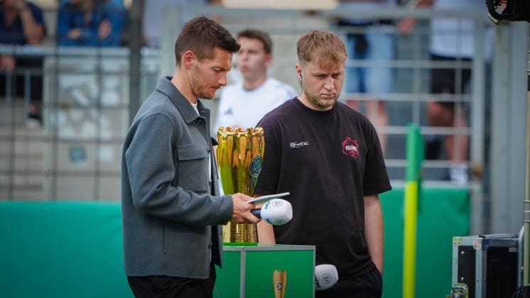 Soccer, A Juniors, Season 2025 2026, DFB Cup, Final, VfB Stuttgart U19 vs VfL Wolfsburg U19, Friday 22 05 2026, Karl Liebknecht Stadium Potsdam, In the picture Andi Lengenfelder l presents the match live for Sky Okan Ceneli r is interview guest Brandenburg Germany