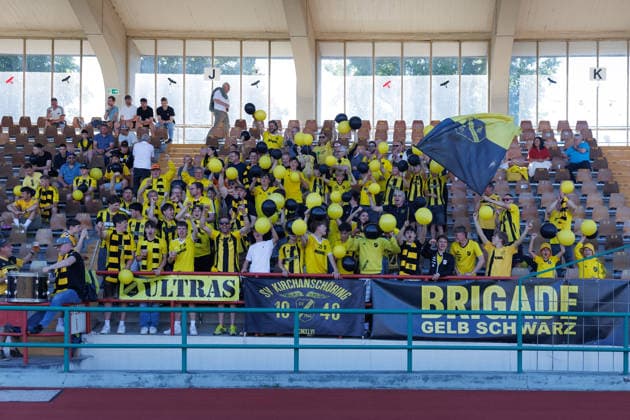 Fans of Team SV Kirchanschöring at the match between TSV Schwaben Augsburg v SV Kirchanschöring, Soccer, Men, Regionalliga Bayern Relegation, 2025 2026, 2 Matchday on 22 05 2026 in Augsburg, Rosenaustadion Bayern Germany