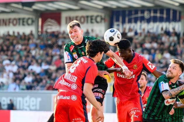 SOCCER - BL, Ried vs Rapid RIED,AUSTRIA,22.MAY.26 - SOCCER - ADMIRAL Bundesliga, Europacup play off, SV Ried vs SK Rapid Wien. Image shows Nikki Havenaar (Ried) and Akouan Romeo Amane (Rapid).  GEPAxpictures xDanielaxMoser