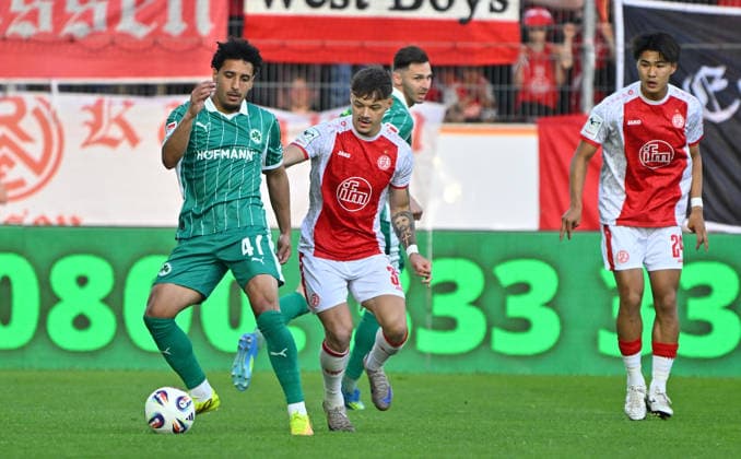 22 05 2026 Soccer season 2025 2026 Relegation 2 Soccer Bundesliga first leg Rot Weiss Essen RWE SpVgg Greuther Fürth Kleeblatt Sportfoto Zink MeZi xmexzix DFL regulations prohibit any use of photographs as image sequences and or quasi video only for editorial use Sayfallah Ltaief 47, SpVgg Greuther Fürth, left Jannik Hofmann 37, Rot Weiss Essen