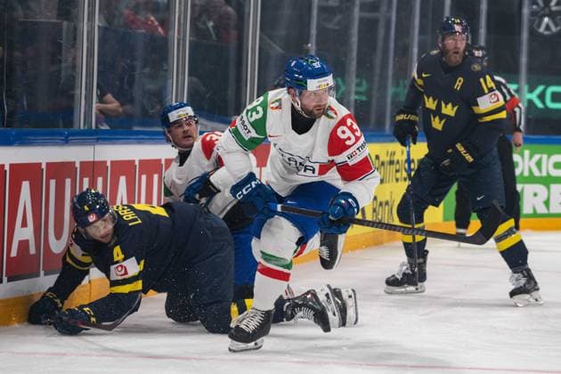 FRIBOURG, FRIBOURG - MAY 22: Luca Frigo of Italy skates away with the puck during the 2026 IIHF World Championship, WM, Weltmeisterschaft Preliminary Round Group B match between Sweden and Italy at BCF Arena on May 22, 2026 in Fribourg, Fribourg, Switzerland.  Copyright: xLivioxBaeriswylx xSPPx Sportspressphoto_SPR151978