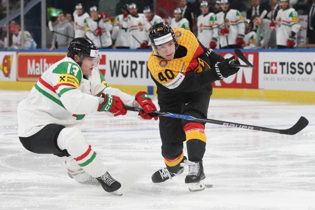 22 05 2026 Swiss Life Arena Zurich , SWITZERLAND, Mens Ice Hockey IIHF World Championship Zurich 2026 Group A GER HUN Krisztian Nagy li,HUN vs Alexander Ehl GER