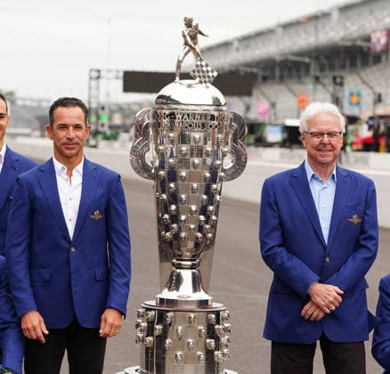 INDIANAPOLIS, IN - MAY 22: From left to right time Indy 500 winners Hello Castroneves and Rick Mears pose with the Borg Warner Trophy on the yard of bricks during Miller Lite Carb Day for the 110th Running of the Indianapolis 500 on May 22, 2026, at the Indianapolis Motor Speedway in Indianapolis, Indiana. (Photo by Brian Spurlock Icon Sportswire) AUTO: MAY 22 NTT IndyCar, Indy Car, IRL, USA Series Miller Lite Carb Day EDITORIAL USE ONLY Icon26052250065